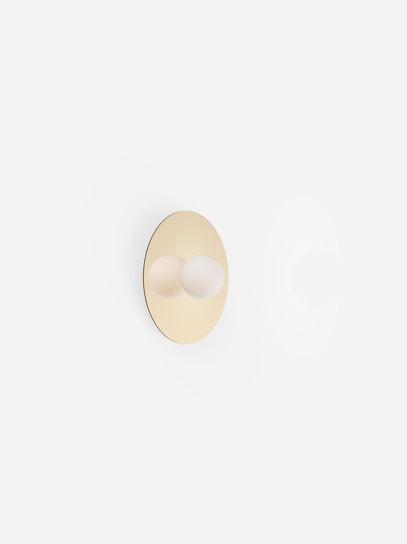 Gold wall hook on a white background