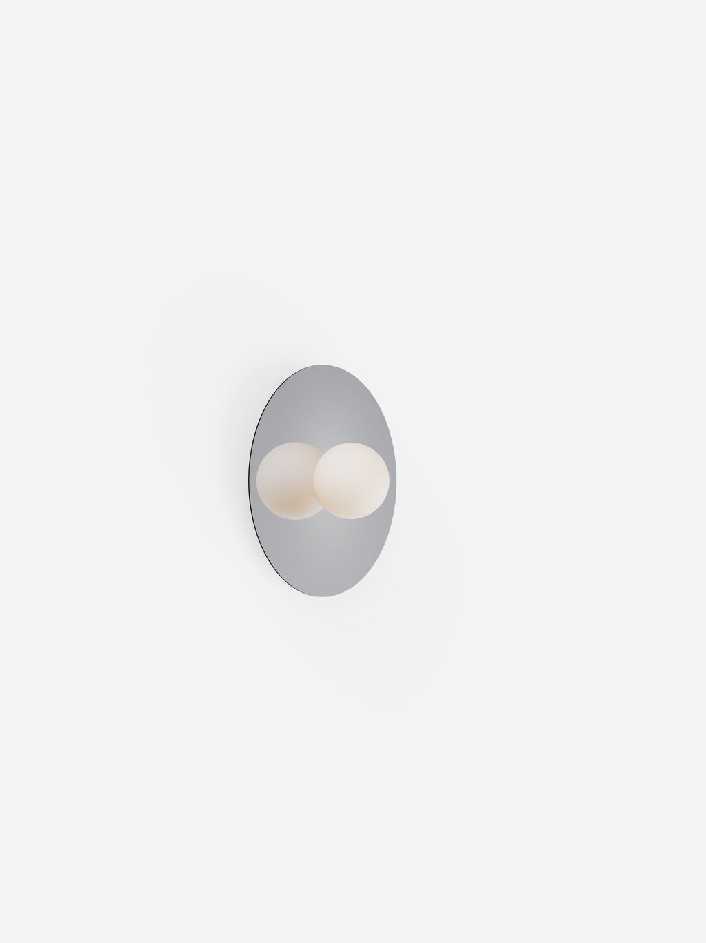 Wall-mounted light fixture with two spherical bulbs on a white background