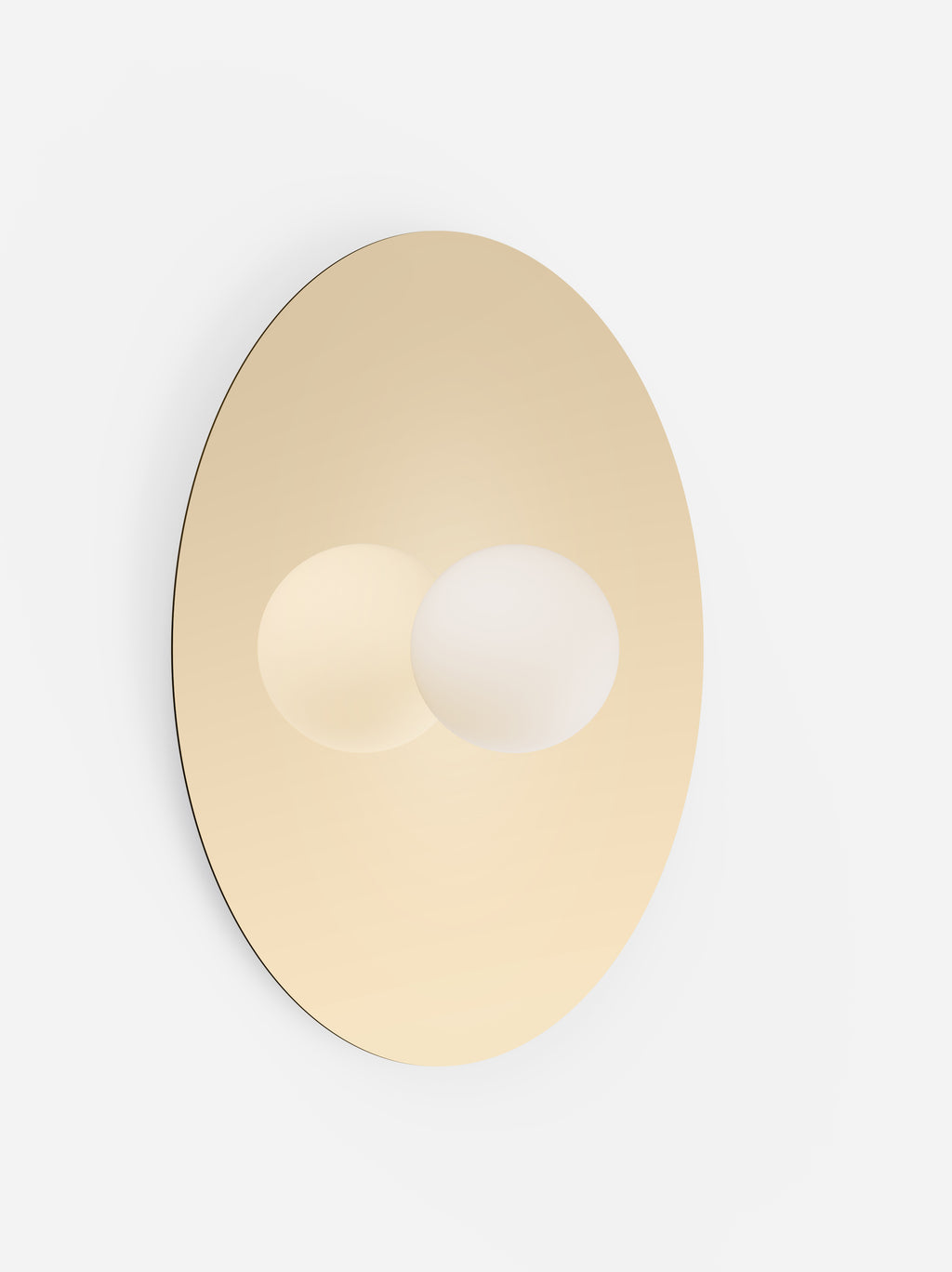 Wall-mounted light fixture with a gold finish on a white background