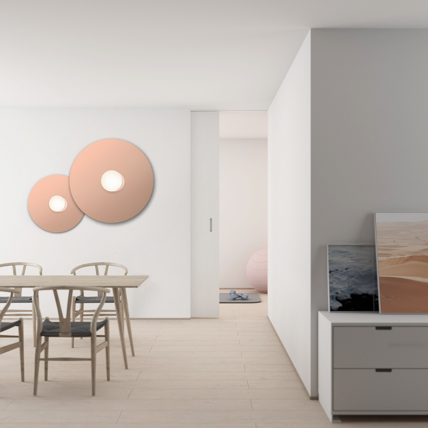 Modern interior with a dining area and wall lights