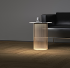 Modern side table with a glass top in a living room setting